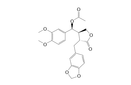 (3R*,4R*)-3-(3,4-Methylenedioxybenzyl)-4-[.alpha.(S*)-.alpha.-acetyloxy-3,4-dimethoxybenzyl]-.gamma.-butyrolactone
