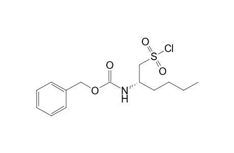 (phenylmethyl) N-[(2S)-1-chloranylsulfonylhexan-2-yl]carbamate