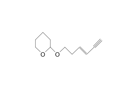 (E)-Tetrahydro-2-(3-hexen-5-yn-1-yloxy)-2H-pyran