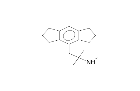 1-(beta-methylaminoisobutyl)-2,3:5,6-bistrimethylenobenzene