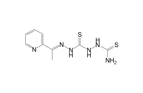 2-(((2E)-2-[1-(2-Pyridinyl)ethylidene]hydrazino)carbothioyl)hydrazinecarbothioamide