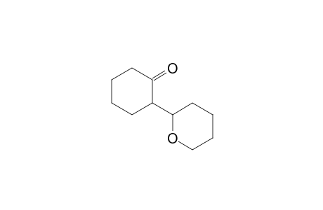 2-(2-oxanyl)-1-cyclohexanone