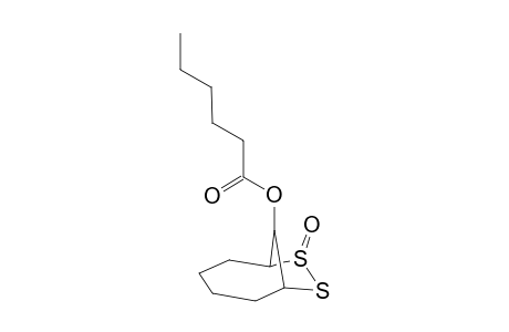 syn-2,3-Dithia-9-[(n-hexanoyl)oxy]bicyclo[4.2.1]nonane S-oxide