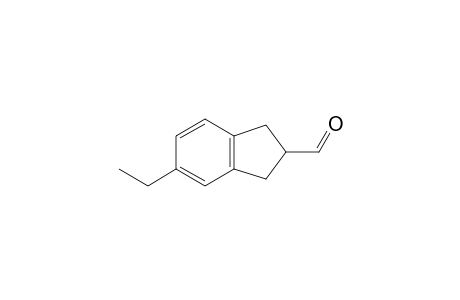 2,3-Dihydro-5-ethyl-1H-indene-2-carboxaldehyde