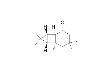 Tricyclo[4.3.0.07,9]nonan-2-one, 4,4,6,8,8-pentamethyl-, (1.alpha.,6.alpha.,7.beta.,9.beta.)-(.+-.)-