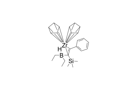 (Biscyclopentadienylzirconium)((trimethylsilyl)phenylethenyl)(.mu.-hydro)(diethylboronium) complex