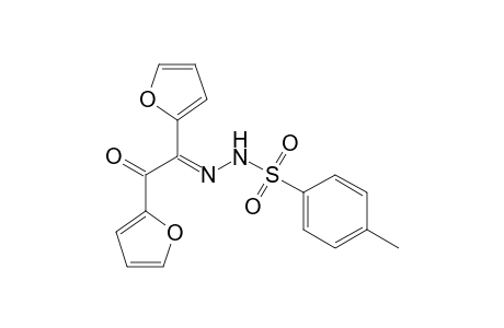 N-[(E)-[1,2-bis(2-furanyl)-2-oxoethylidene]amino]-4-methylbenzenesulfonamide