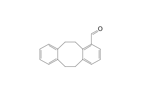 5,6,11,12-Tetrahydrodibenzo[a,e]cyclooctene-1-carboxaldehyde