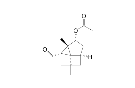 Tricyclo[4.2.0.0(1,3)]octane-2-carboxaldehyde, 4-(acetyloxy)-3,8,8-trimethyl-, (1S*,2.alpha.,3.beta.,4.alpha.,6.alpha.)-