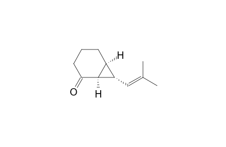 Bicyclo[4.1.0]heptan-2-one, 7-(2-methyl-1-propenyl)-, (1.alpha.,6.alpha.,7.alpha.)-(.+-.)-