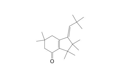 4H-Inden-4-one, 1-(2,2-dimethylpropylidene)-1,2,3,5,6,7-hexahydro-2,2,3,3,6,6-hexamethyl-, (E)-