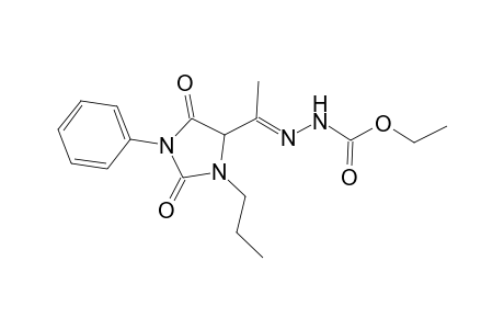 Ethyl 2-[1-(2,5-dioxo-1-phenyl-3-propylimidazolidin-4-yl)ethylidene]hydrazinecarboxylate
