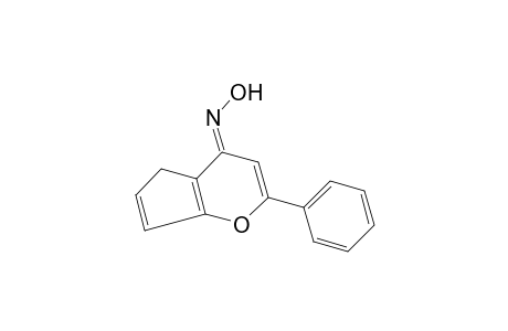 2-PHENYLCYCLOPENTENO[b]PYRAN-4(4H)-ONE, OXIME
