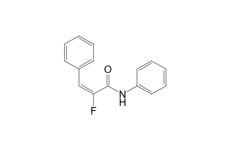 (E)-2-fluoranyl-N,3-diphenyl-prop-2-enamide