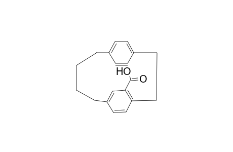 Tricyclo[10.2.2.2*4,7*]octadeca-1(15),4,6,12(16),13,17-hexaene-5-carboxylic acid