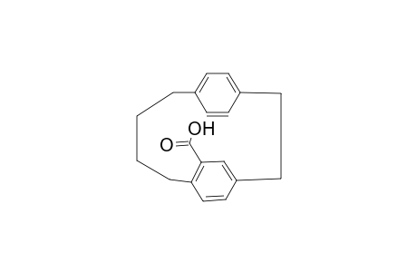 Tricyclo[10.2.2.2*4,7*]octadeca-1(15),4,6,12(16),13,17-hexaene-6-carboxylic acid