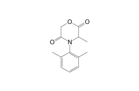 2,5-Morpholinedione, 4-(2,6-dimethylphenyl)-3-methyl-, (+/-)-