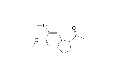 1-(5,6-dimethoxy-2,3-dihydro-1H-inden-1-yl)ethanone