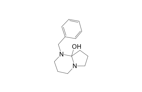 Pyrrolo[1,2-a]pyrimidin-8a(6H)-ol, hexahydro-1-(phenylmethyl)-