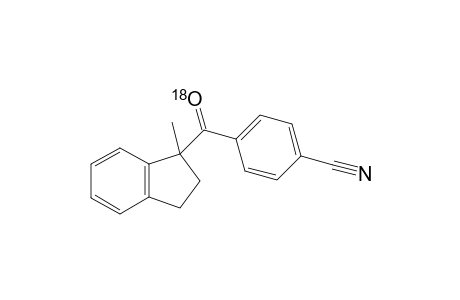 4-[(1-methyl-2,3-dihydro-1H-inden-1-yl)(((18)O)oxo)methyl]benzonitrile