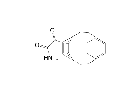 Tricyclo[8.2.2.24,7]hexadeca-4,6,10,12,13,15-hexaene-5-acetamide, N-methyl-.alpha.-oxo-
