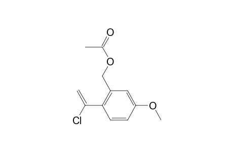 2-(1-Chlorovinyl)-5-methoxybenzyl acetate