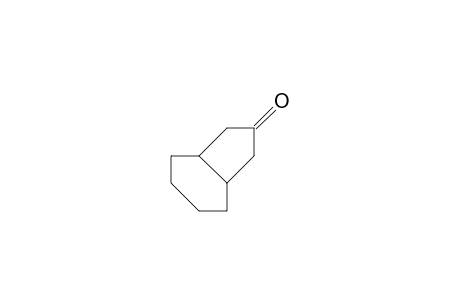 2-Indanone, hexahydro-, trans-