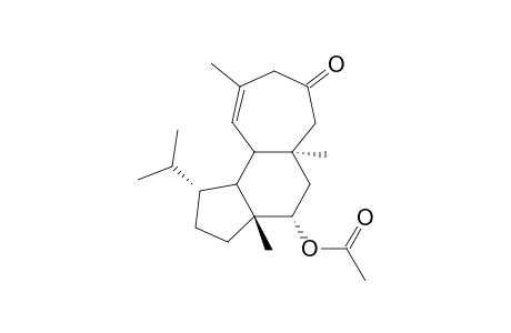 Cyclohept[e]inden-9(1H)-one, 4-(acetyloxy)-2,3,3a,4,5,5a,6,8,10a,10b-decahydro-3a,5a,9-trimethyl-1 -(1-methylethyl)-, [1S-(1.alpha.,3a.beta.,4.alpha.,5a.alpha.,10a.beta.,10b.alpha.)]-