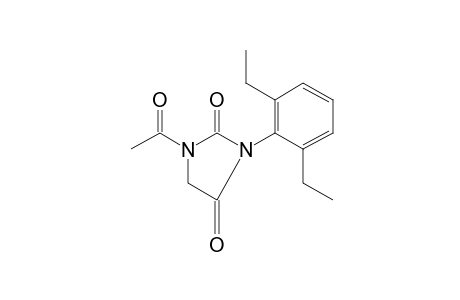 1-acetyl-3-(2,6-diethylphenyl)hydantoin