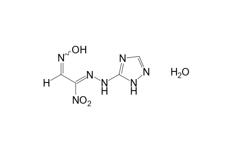 1-(1-nitro-2-hydroxyiminoethylidene)-2-s-triazine-5-ylhydrazine, monohydrate