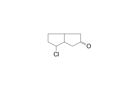 Bicyclo[3.3.0]octan-3-one, 8-chloro-