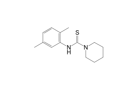 Thio-1-piperidinecarboxy-2',5'-xylidide