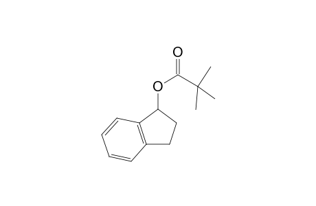 2,2-Dimethylpropanoic acid 2,3-dihydro-1H-inden-1-yl ester