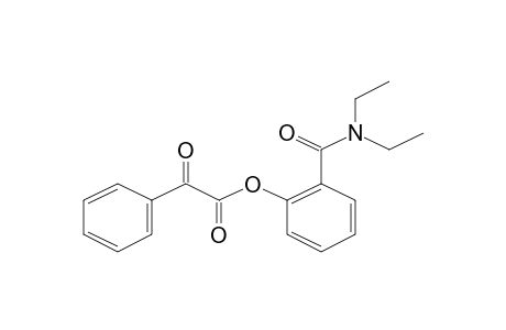 Glyoxylic acid, phenyl-, 2'-(diethylaminocarbonyl)phenyl ester