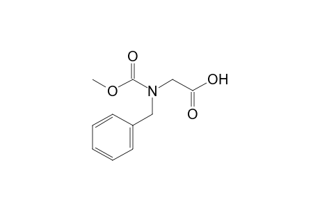 2-[Benzyl(carbomethoxy)amino]acetic acid