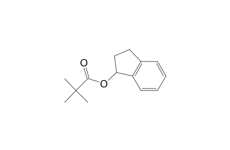 2,2-Dimethylpropanoic acid 2,3-dihydro-1H-inden-1-yl ester