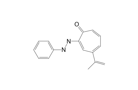 4-Isopropenyl-2-(2-phenylhydrazino)tropone