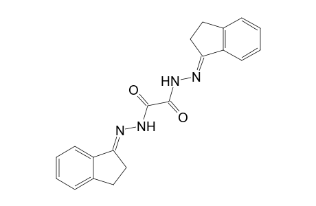 Oxalic acid bis[N'-(indan-1-ylidene)hydrazide]