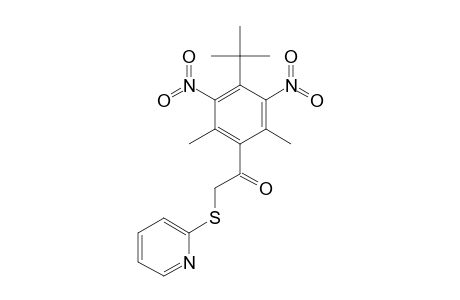 4'-tert-butyl-2',6'-dimethyl-3',5'-dinitro-2-[(2-pyridyl)thio]acetophenone