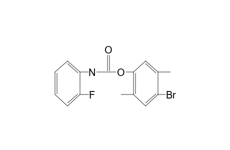 o-fluorocarbanilic acid, 4-bromo-2,5-xylyl ester