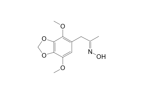 (E)-N-[1-(4,7-dimethoxy-2H-1,3-benzodioxol-5-yl)propan-2-ylidene]hydroxylamine