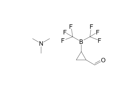 Trimethylamine-( 1- formylcyclopropyl)-bis(trifluoromethyl) borane