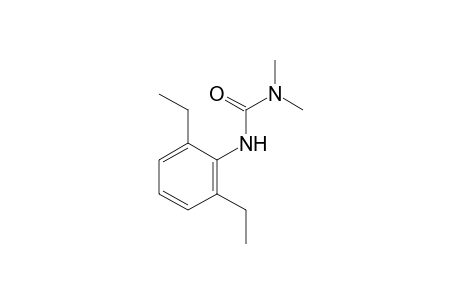 3-(2,6-diethylphenyl)-1,1-dimethylurea