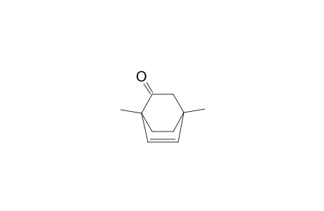 Bicyclo[2.2.2]oct-5-en-2-one, 1,4-dimethyl-, (.+-.)-