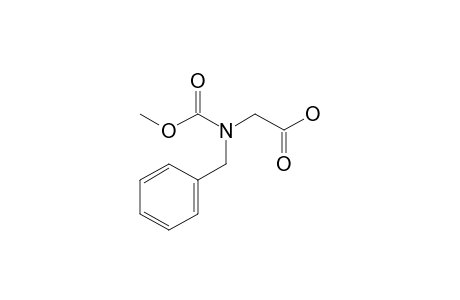 2-[Benzyl(carbomethoxy)amino]acetic acid