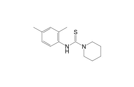 Thio-1-piperidinecarboxy-2',4'-xylidide