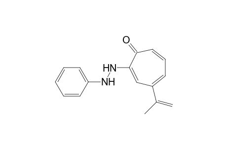 4-Isopropenyl-2-(2-phenylhydrazino)tropone