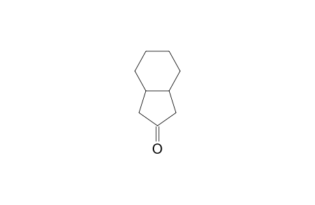 2-Indanone, hexahydro-, trans-
