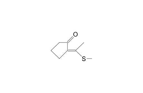 (E)-2-(1-Methylthio-ethylidene)-cyclopentanone