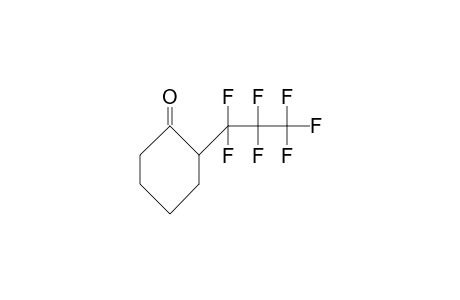 2-Heptafluoropropyl-cyclohexanone
